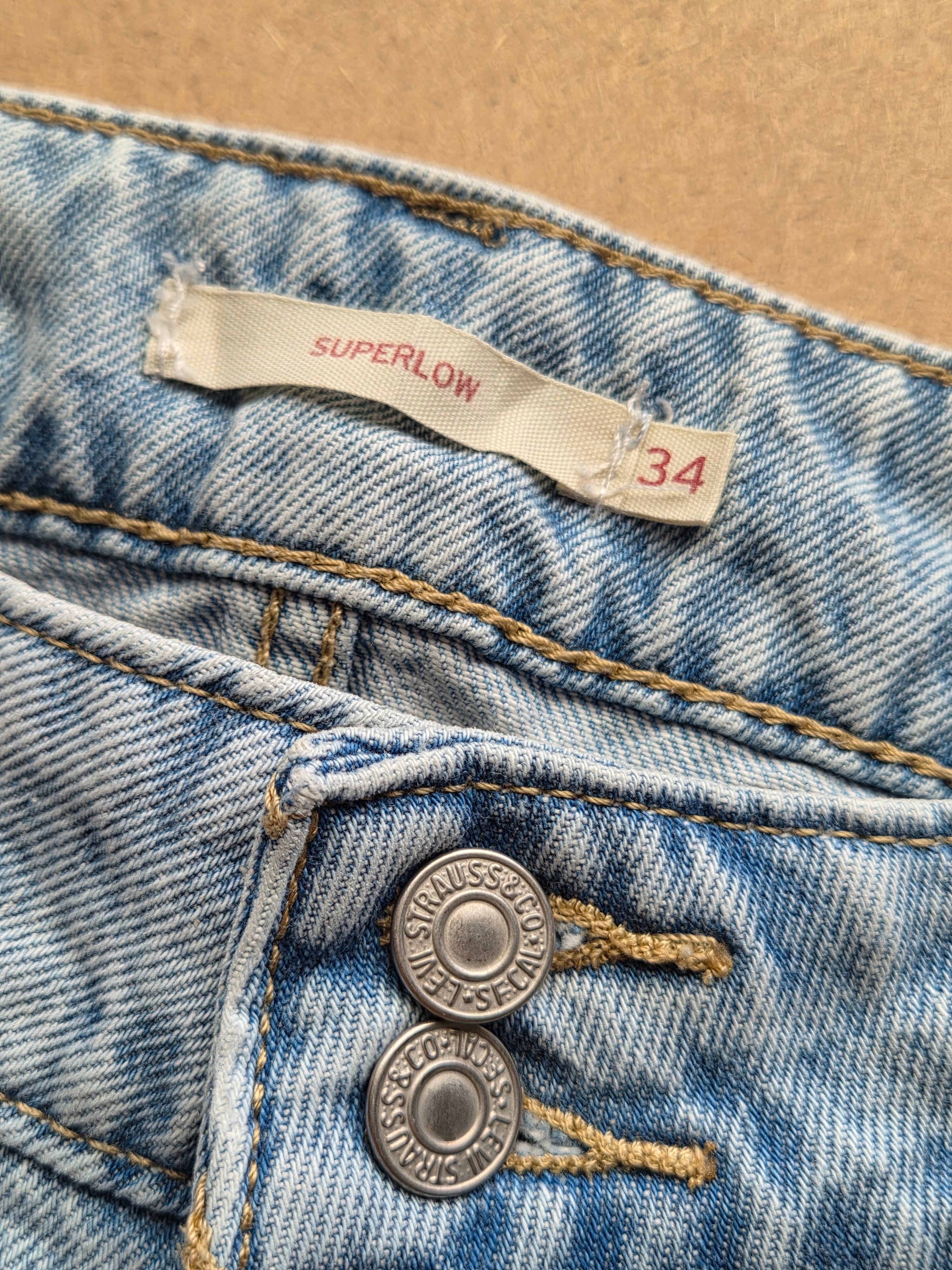 Jean Levi's Superlow Vintage Bleu Clair – Coupe Large Wide Leg (Bas Effilochés) Taille 44 FR